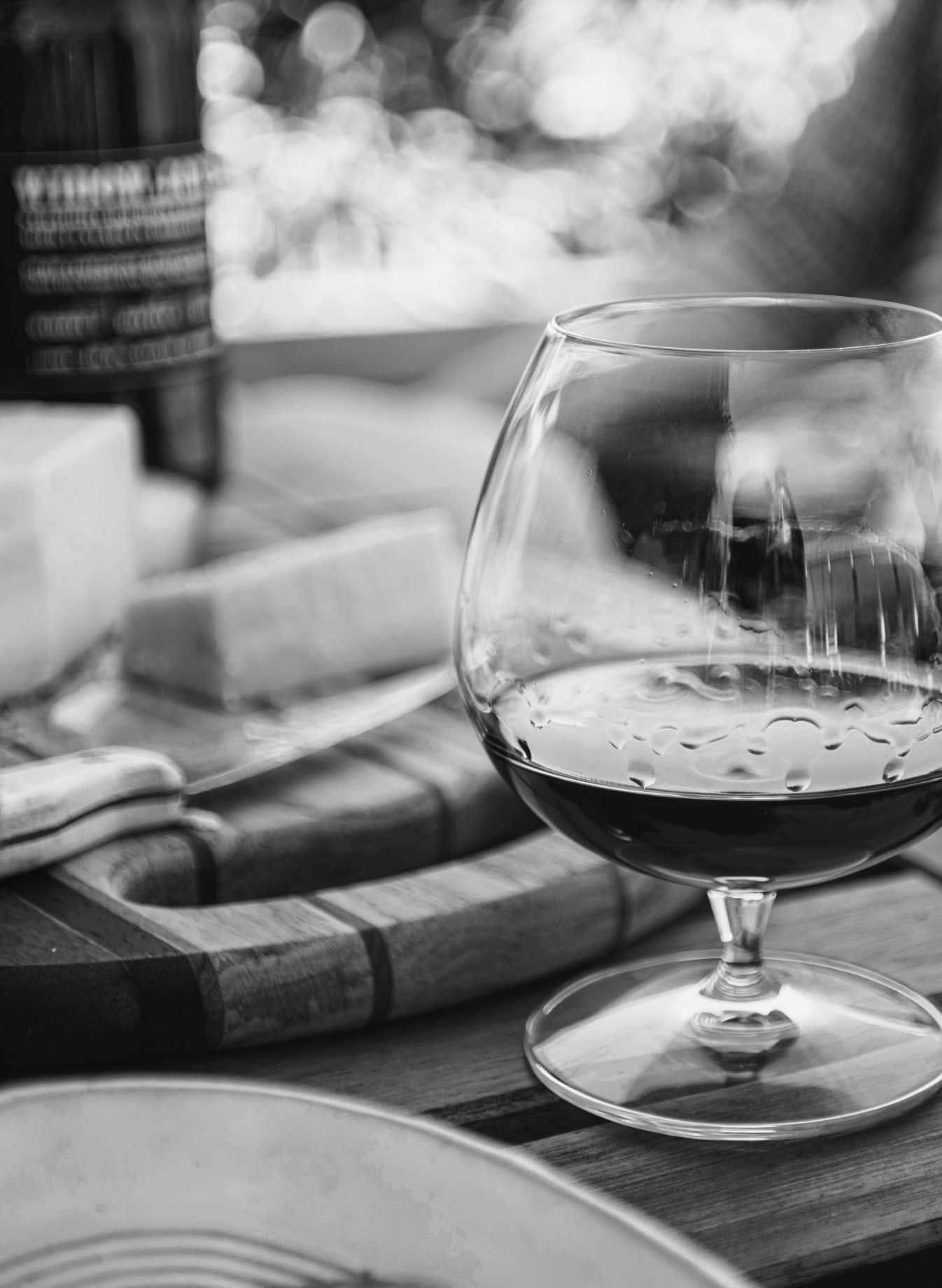 Glass containing a beverage, with a blurred background